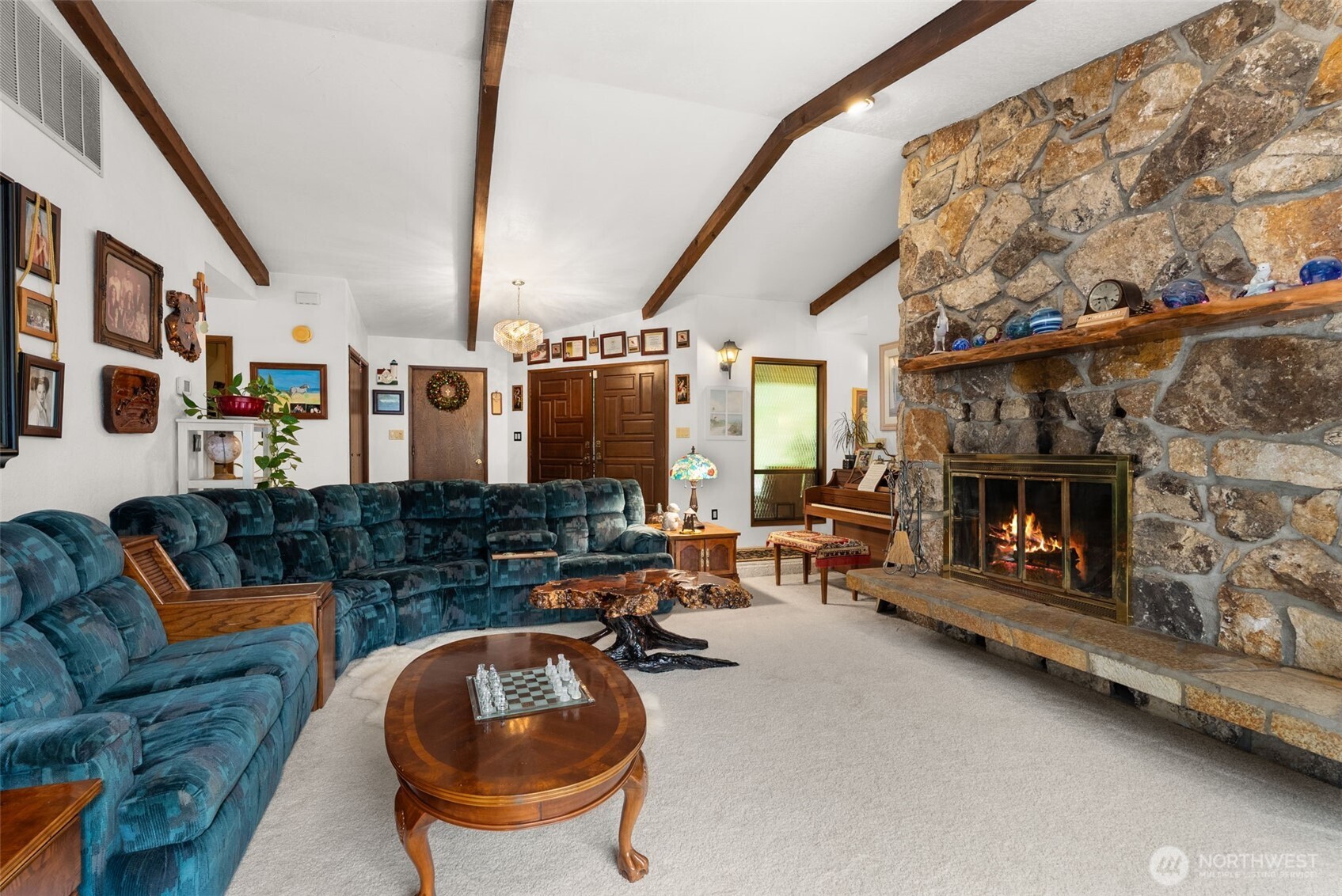 43 Hines Valley Road Raymond, WA 98577 - Photo 13 of 40 a living room with furniture and a fireplace