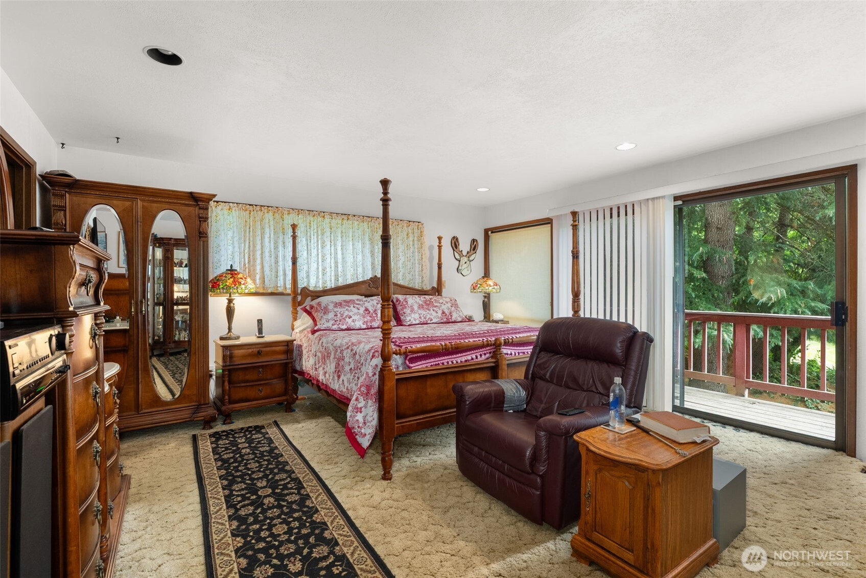 43 Hines Valley Road Raymond, WA 98577 - Photo 18 of 40 a bedroom with furniture and a rug