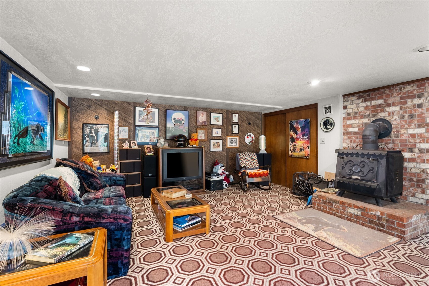 43 Hines Valley Road Raymond, WA 98577 - Photo 23 of 40 a living room with furniture a rug and a flat screen tv