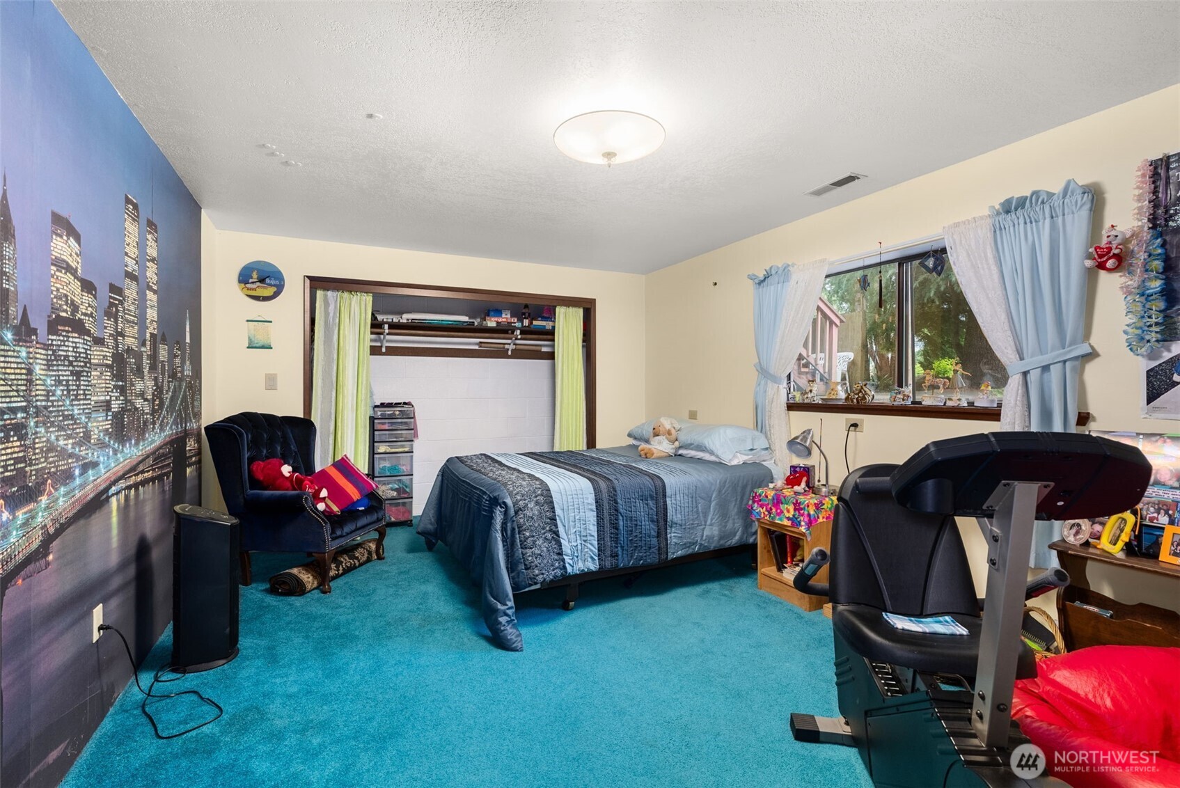 43 Hines Valley Road Raymond, WA 98577 - Photo 25 of 40 a bedroom with bed and a window