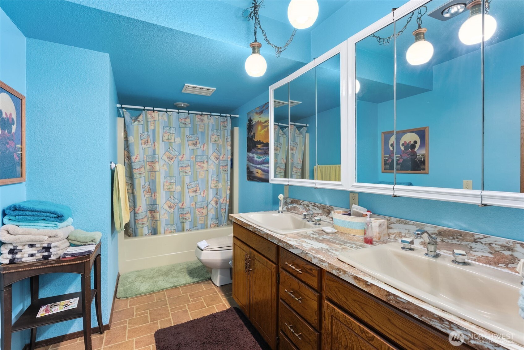 43 Hines Valley Road Raymond, WA 98577 - Photo 26 of 40 a bathroom with a sink double vanity and a mirror