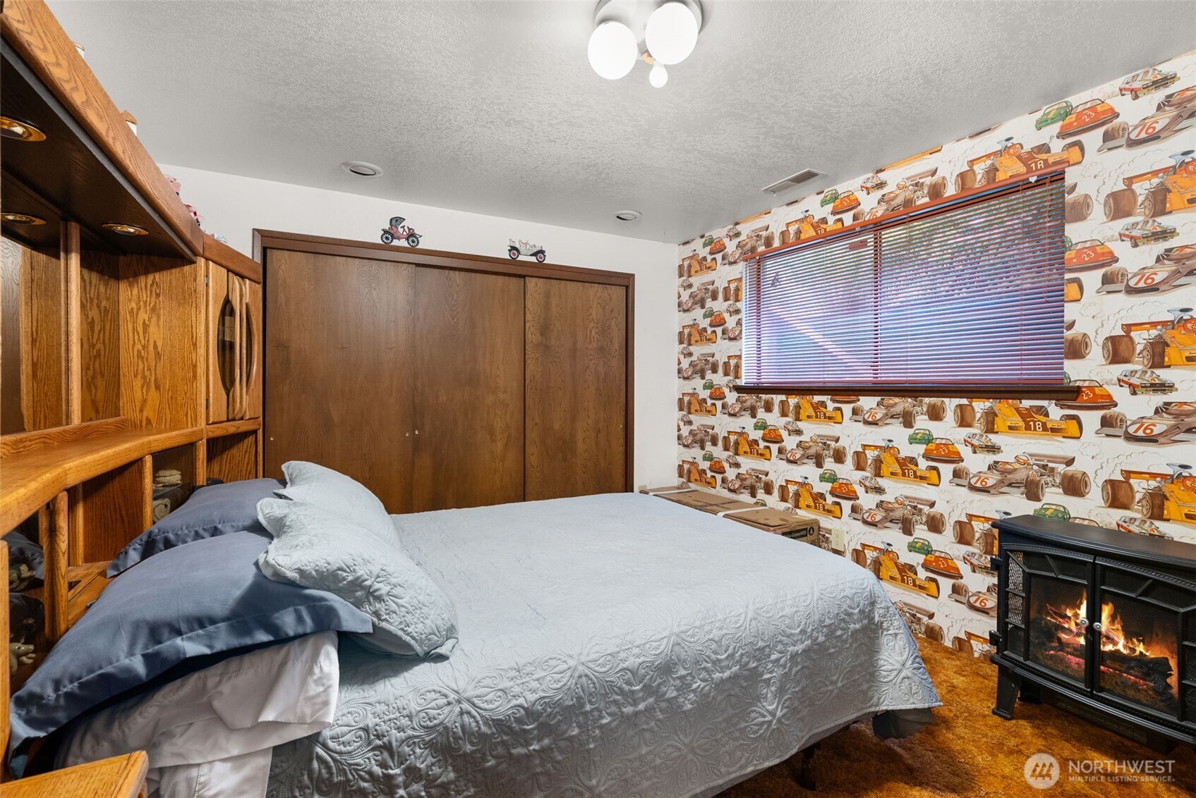 43 Hines Valley Road Raymond, WA 98577 - Photo 27 of 40 a bedroom with a bed and a dresser