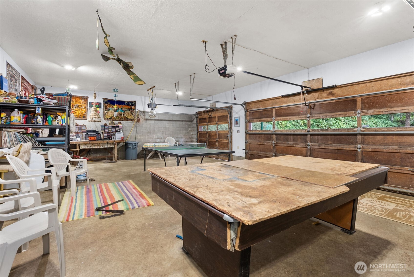 43 Hines Valley Road Raymond, WA 98577 - Photo 28 of 40 a room with stainless steel appliances lots of wooden furniture