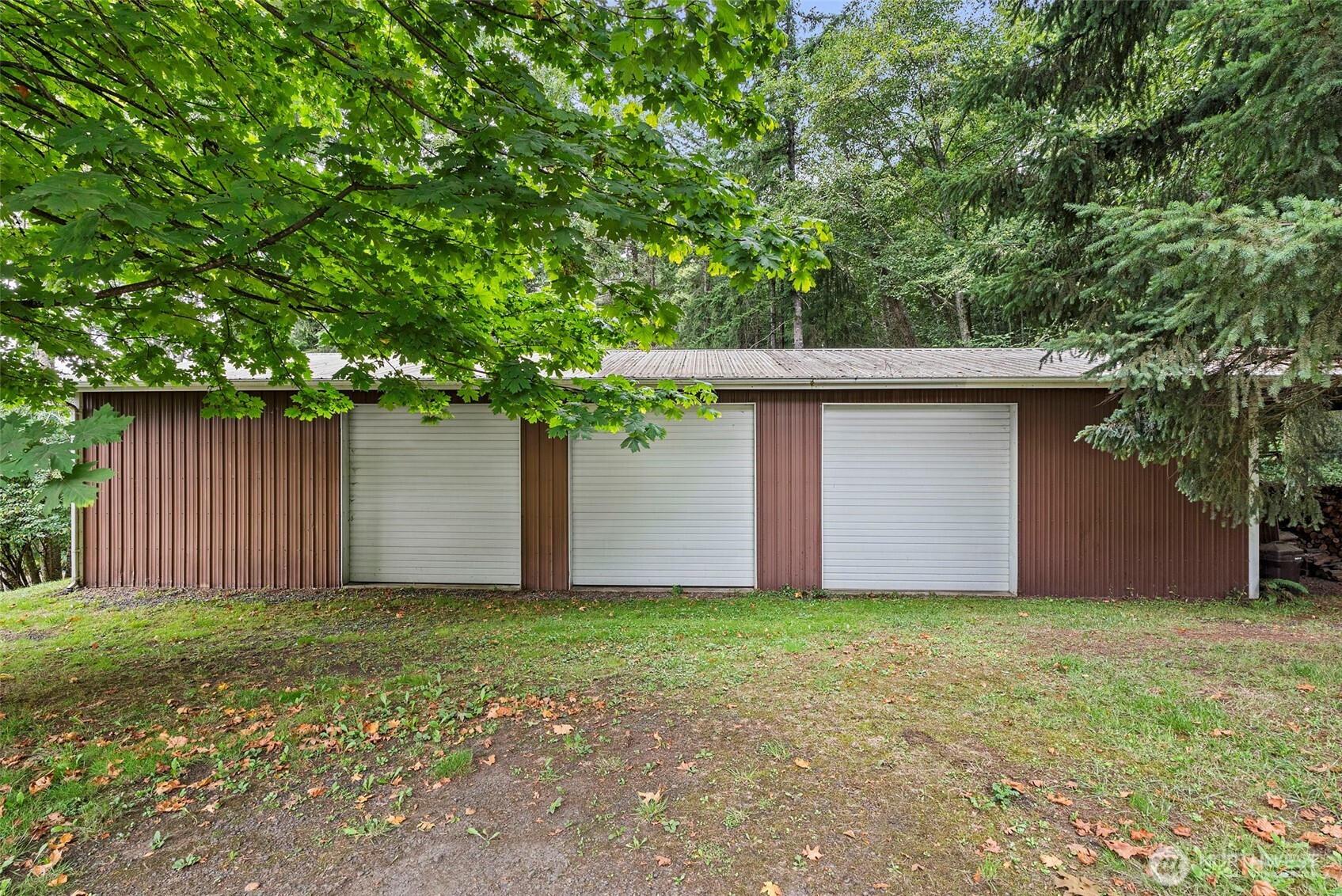 43 Hines Valley Road Raymond, WA 98577 - Photo 5 of 40 a front view of a house with a garage