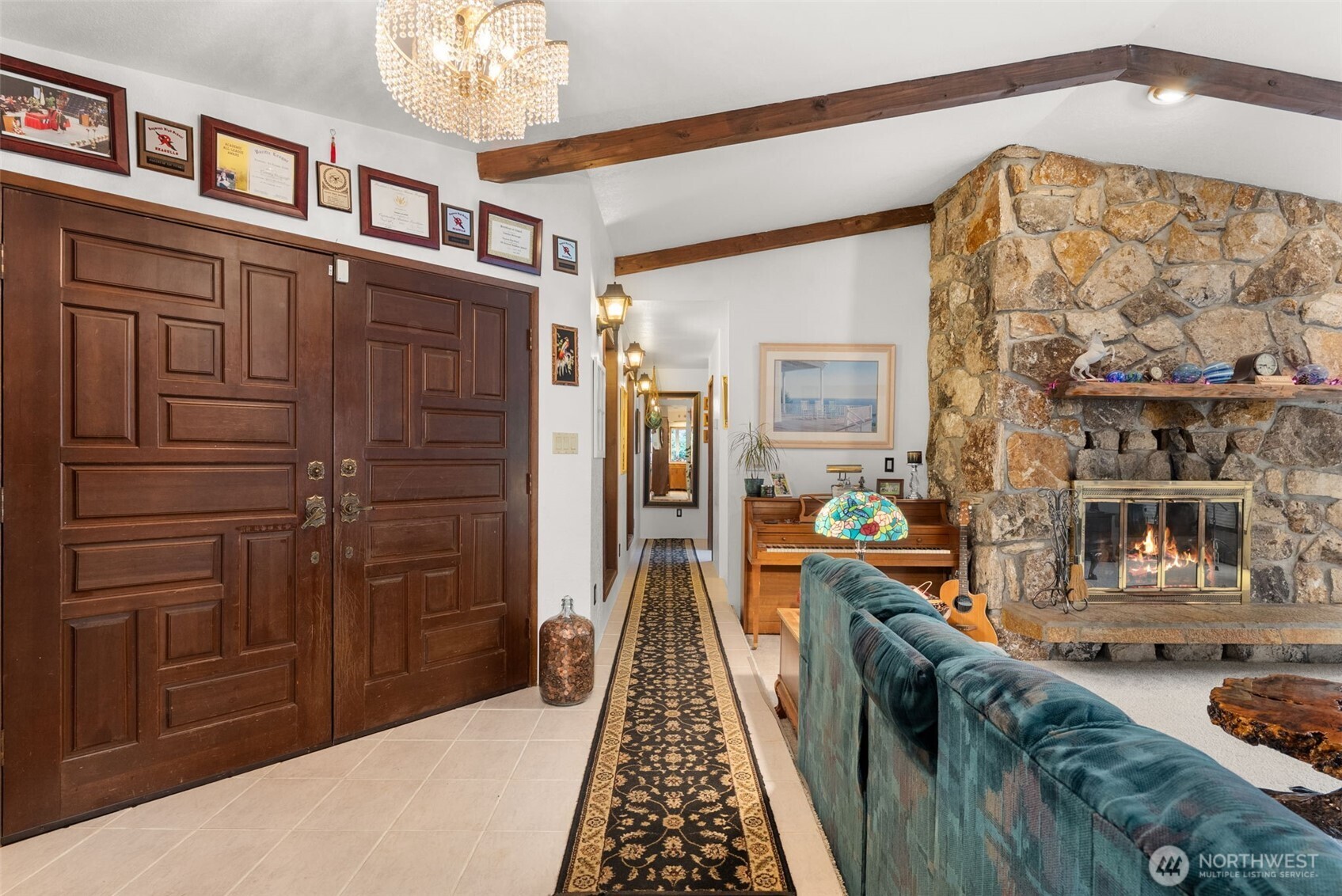 43 Hines Valley Road Raymond, WA 98577 - Photo 9 of 40 a hallway with a dining table and chairs