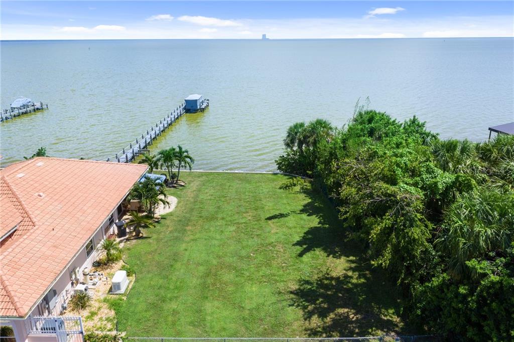 3645 S Washington Ave with DIRECT Indian River frontage! End lot with tons of privacy on south side