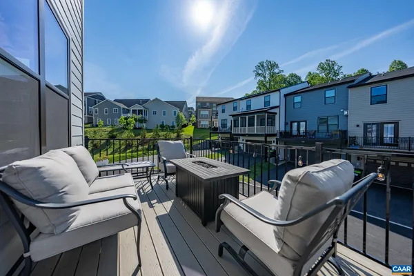 a view of a patio with couches table and chairs