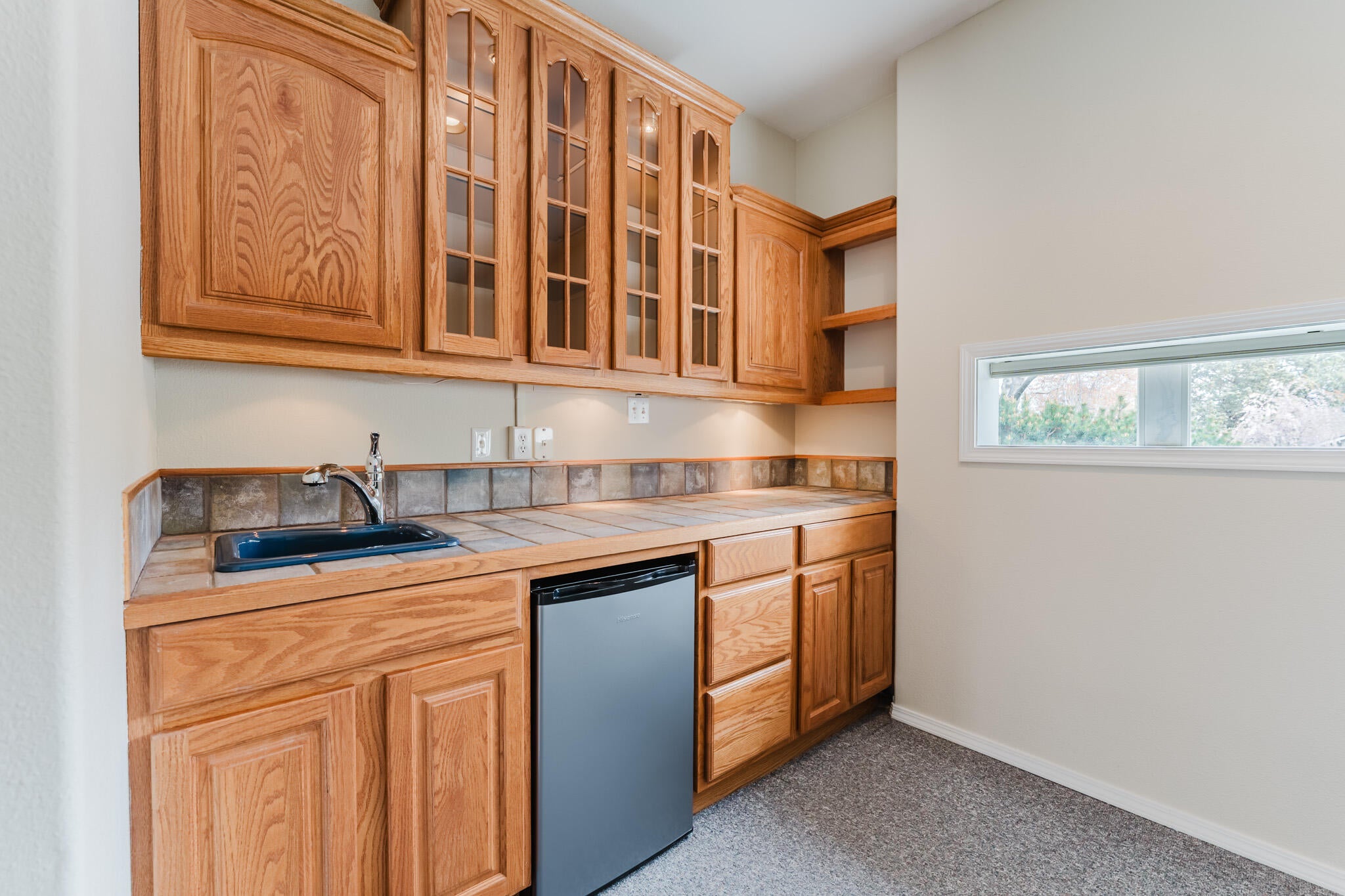3626 Southwest Volcano Court Redmond, OR 97756 - Photo 33 of 89 It includes this wet bat bar with a mini fridge.
