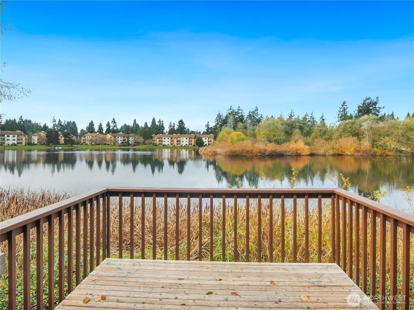 30853 13th Place South, Unit 2 Federal Way, WA 98003 - Photo 1 of 37 a balcony with trees in front of it