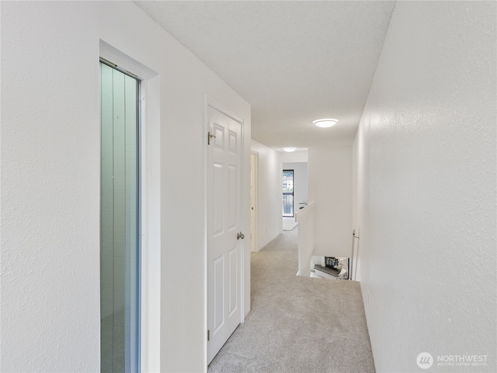 30853 13th Place South, Unit 2 Federal Way, WA 98003 - Photo 15 of 37 a view of a livingroom with a hallway
