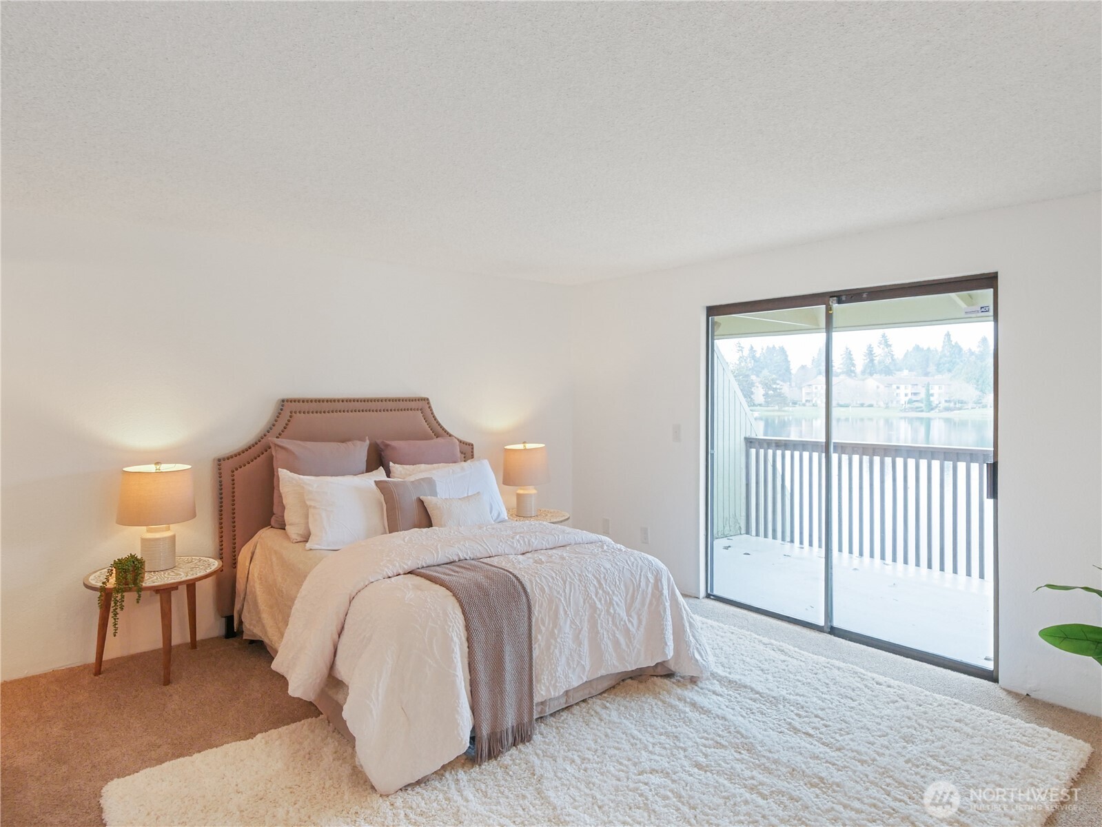 30853 13th Place South, Unit 2 Federal Way, WA 98003 - Photo 16 of 37 a bedroom with a bed and a window
