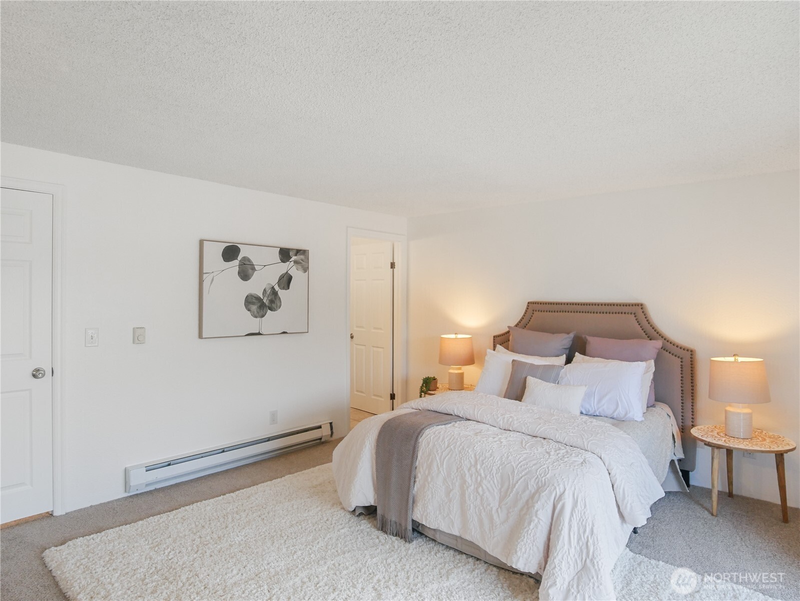 30853 13th Place South, Unit 2 Federal Way, WA 98003 - Photo 18 of 37 a bedroom with a bed and a night stand