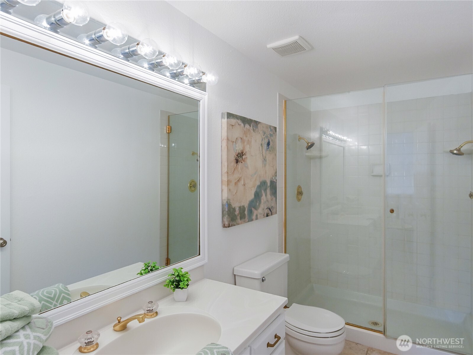 30853 13th Place South, Unit 2 Federal Way, WA 98003 - Photo 20 of 37 a bathroom with a sink a toilet and shower