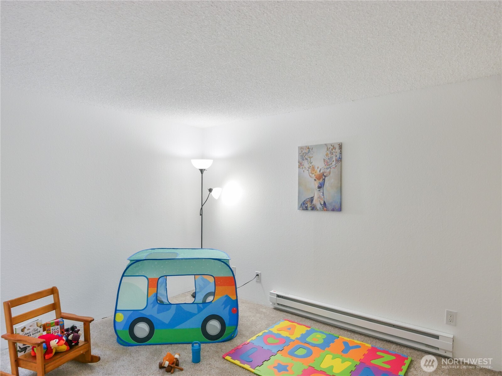 30853 13th Place South, Unit 2 Federal Way, WA 98003 - Photo 25 of 37 a room with toys and dresser with wooden floor