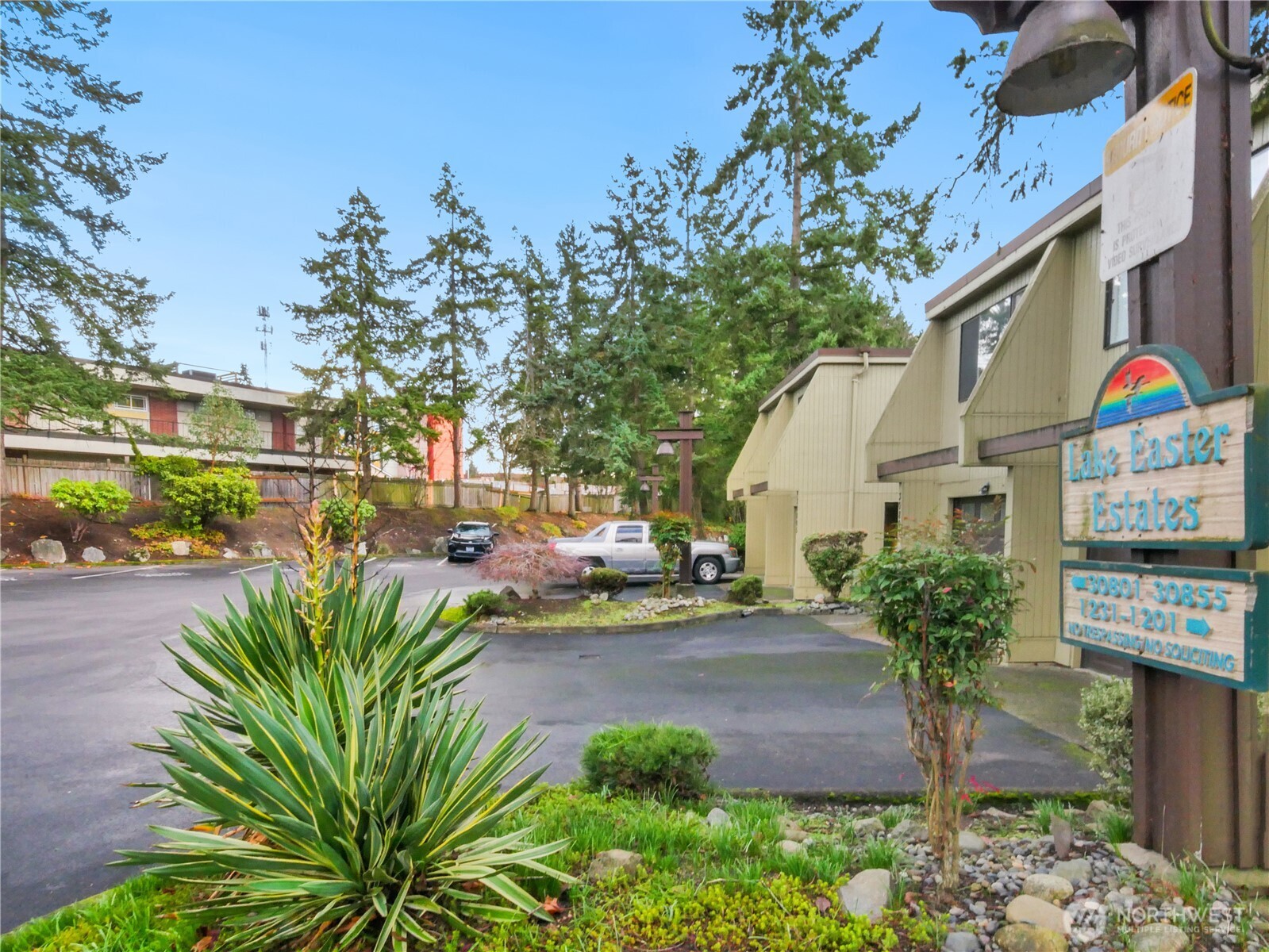30853 13th Place South, Unit 2 Federal Way, WA 98003 - Photo 36 of 37 a view of street with flower plants