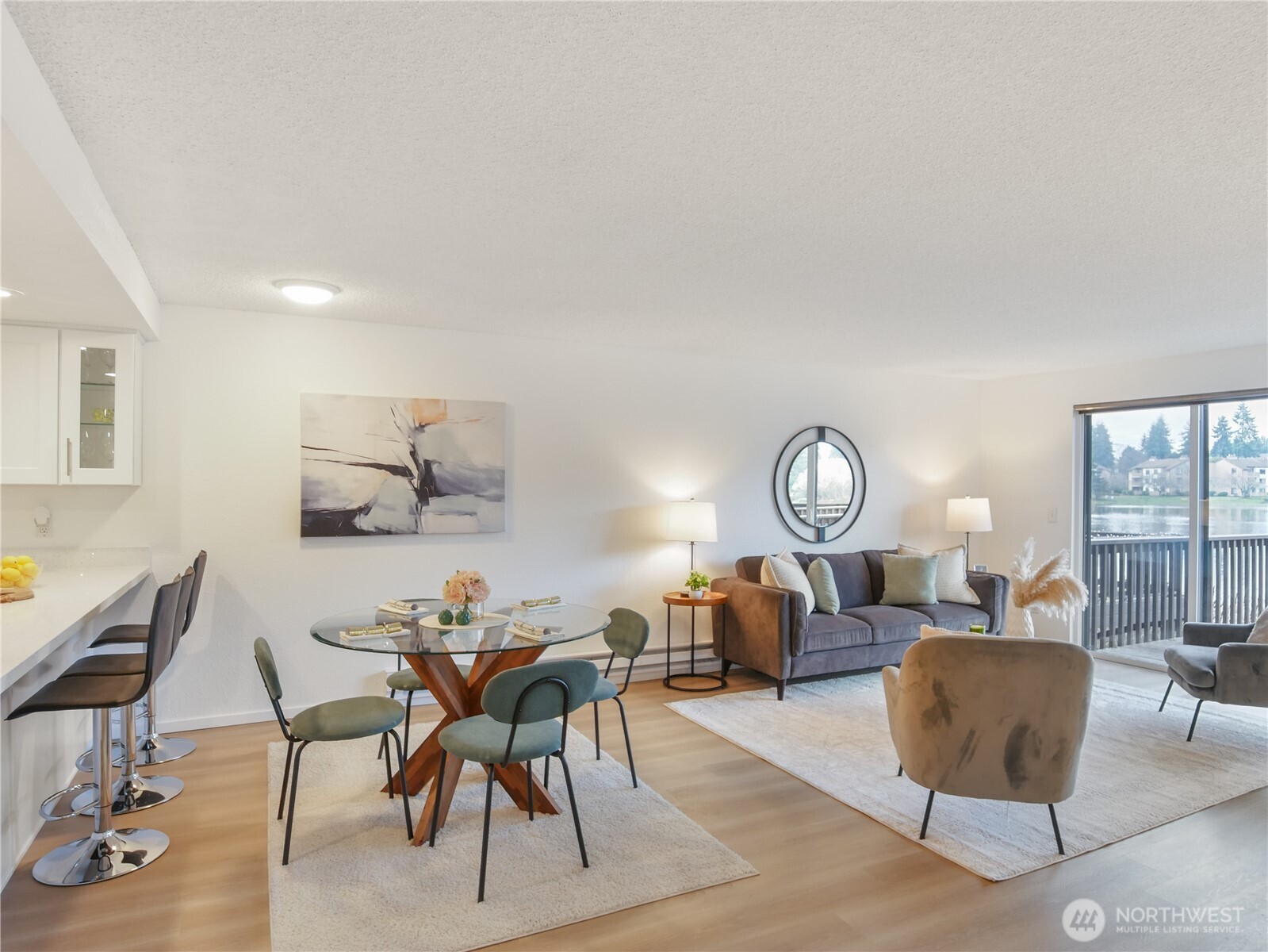 30853 13th Place South, Unit 2 Federal Way, WA 98003 - Photo 6 of 37 a living room with furniture a rug and a table