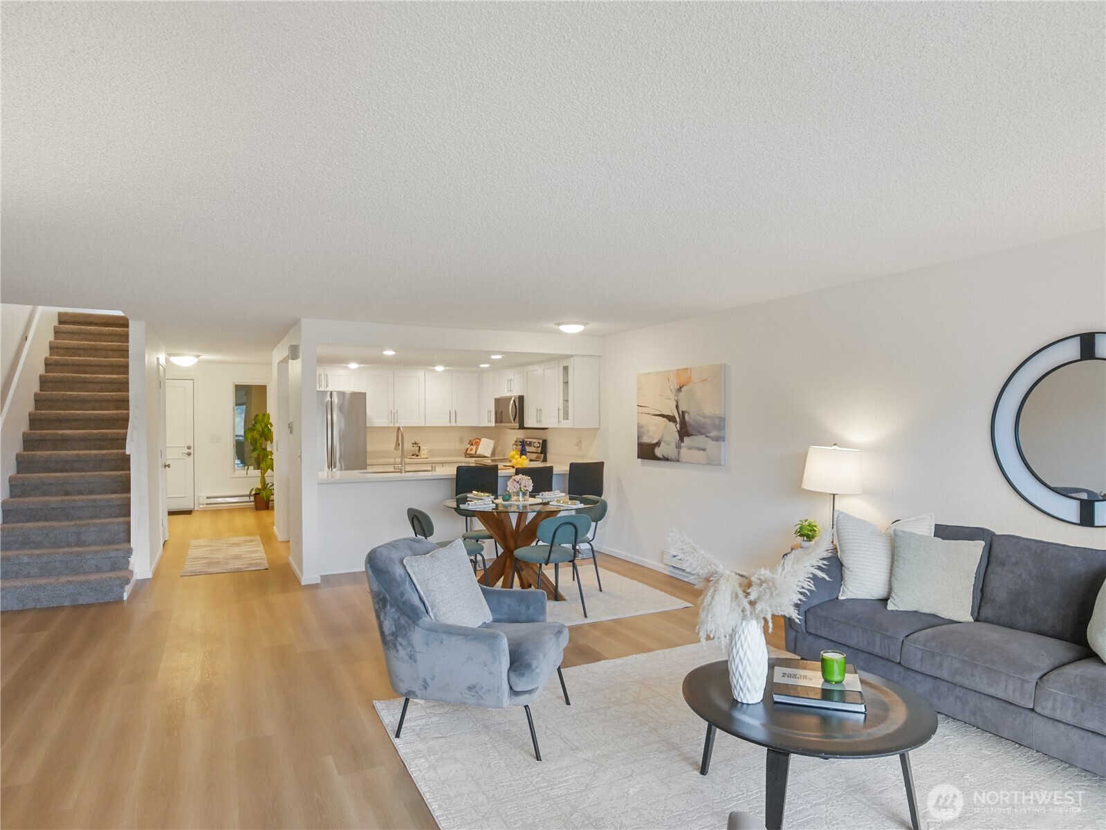 30853 13th Place South, Unit 2 Federal Way, WA 98003 - Photo 8 of 37 a living room with furniture and wooden floor