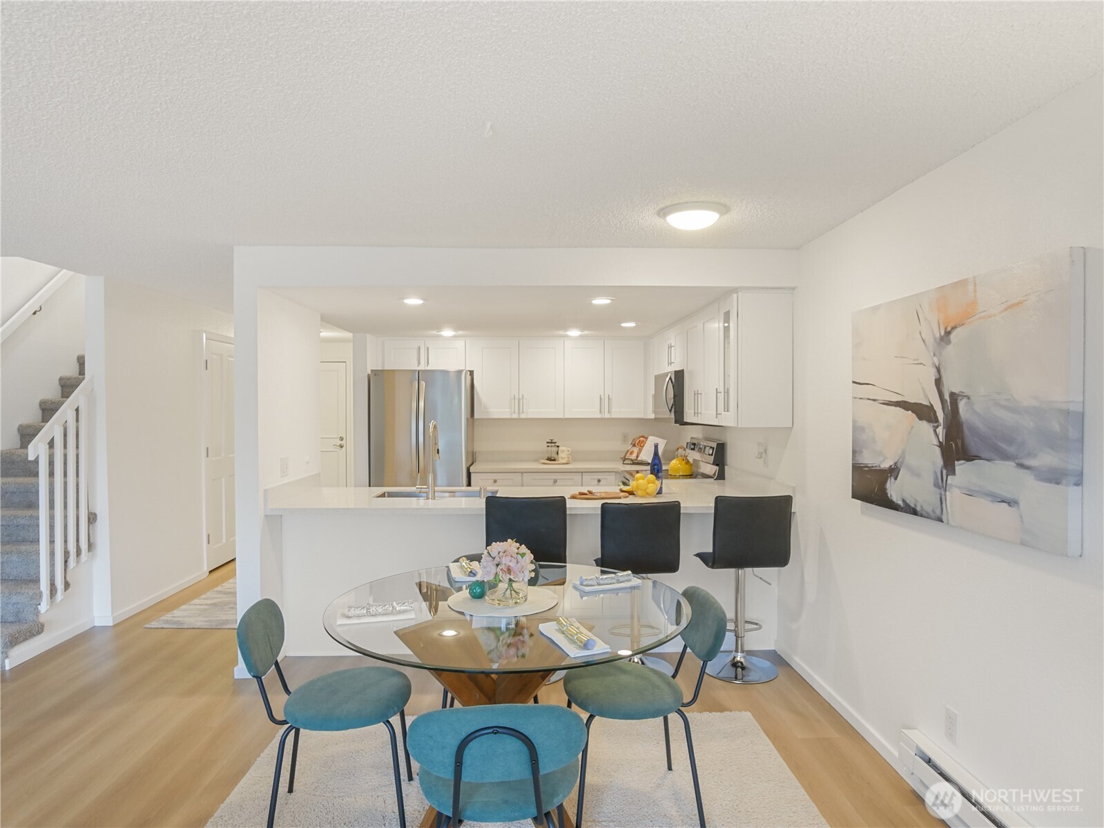 30853 13th Place South, Unit 2 Federal Way, WA 98003 - Photo 10 of 37 a view of a dining room with furniture