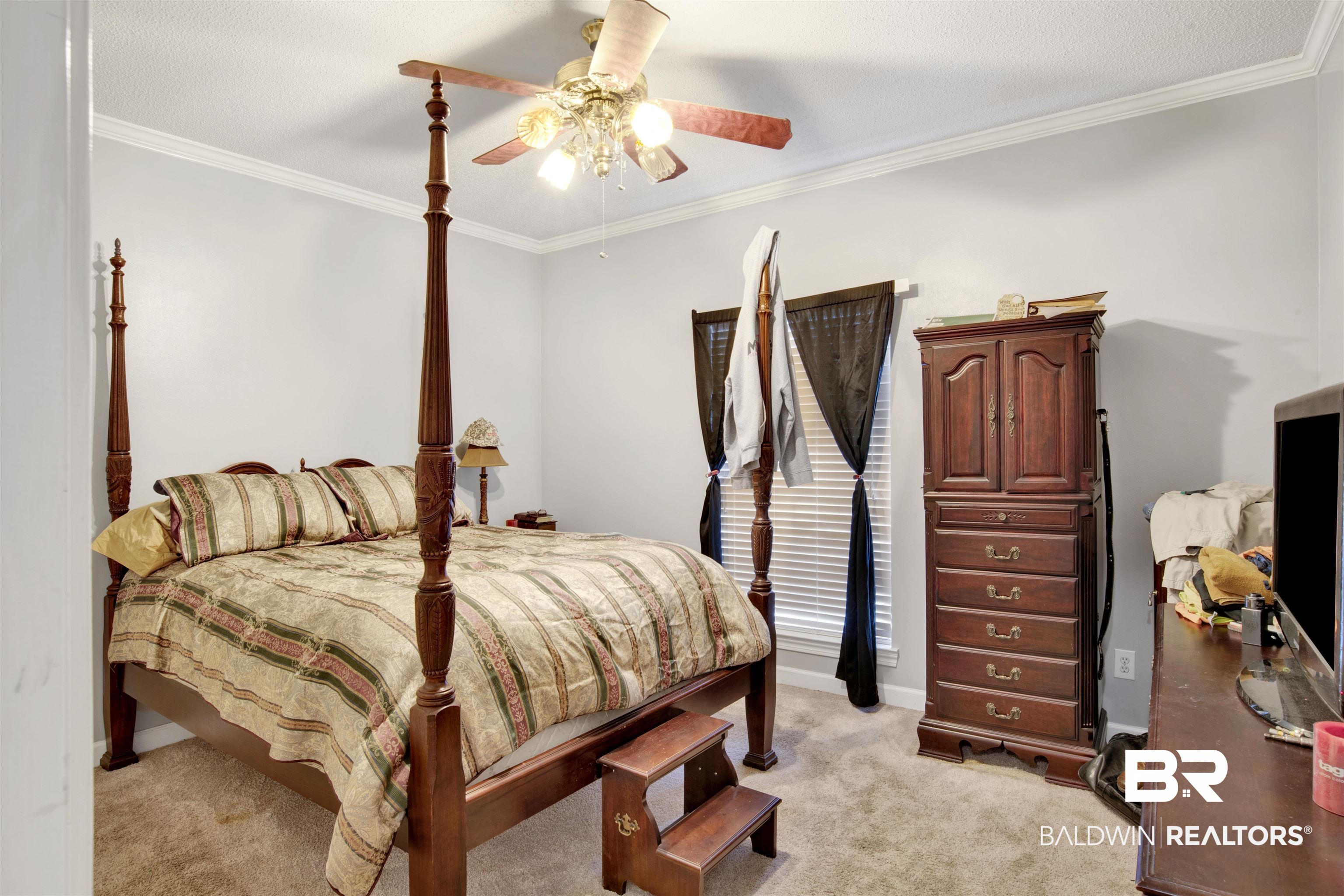 445 Wedgefield Drive South Mobile, AL 36608 - Photo 16 of 36 Carpeted bedroom featuring ceiling fan and ornamental molding