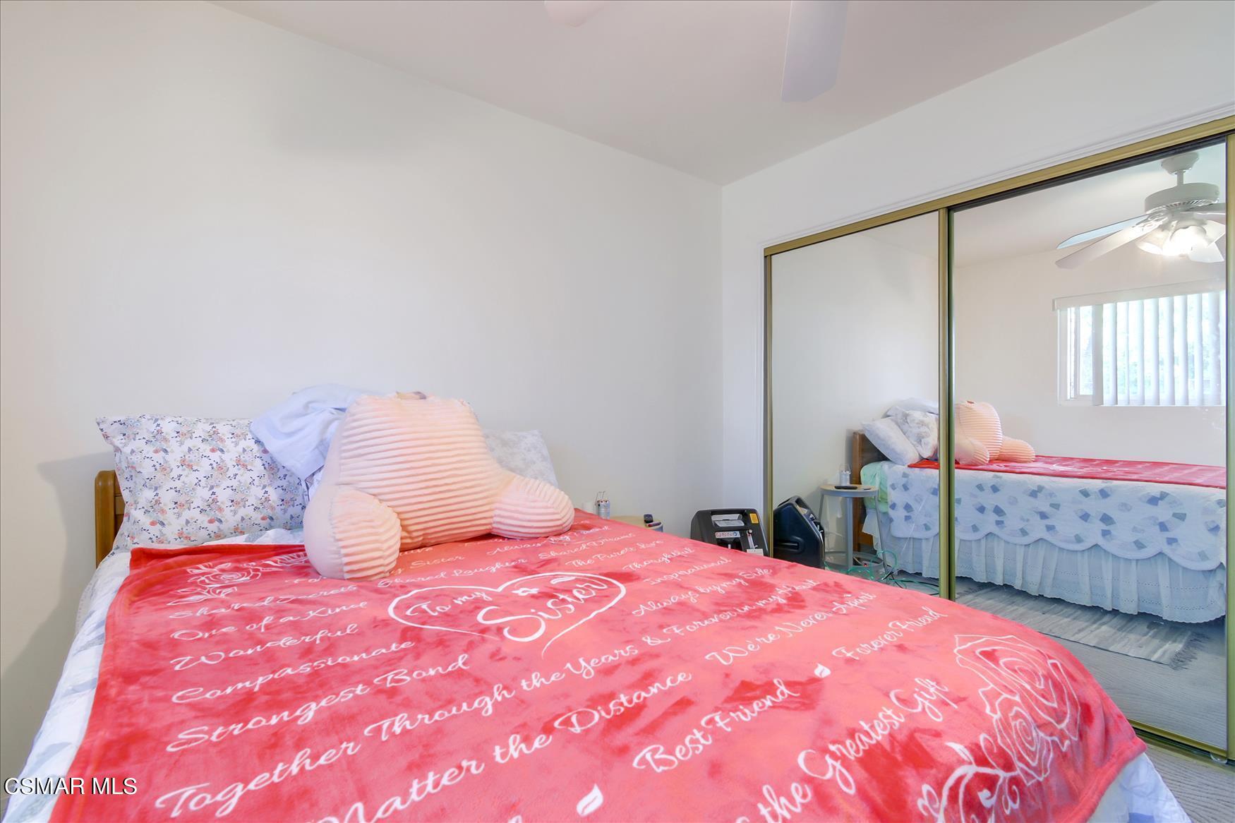 4245 Adam Road Simi Valley, CA 93063 - Photo 11 of 20 a bedroom with a large bed and a dresser