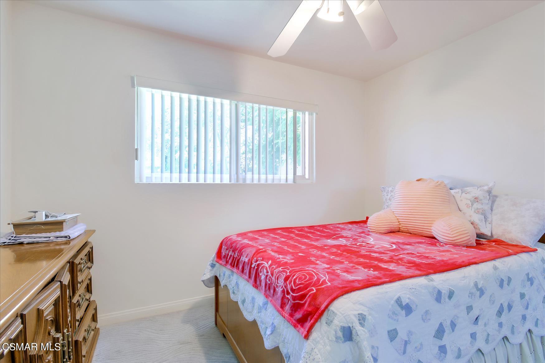 4245 Adam Road Simi Valley, CA 93063 - Photo 12 of 20 a bedroom with a bed and a window