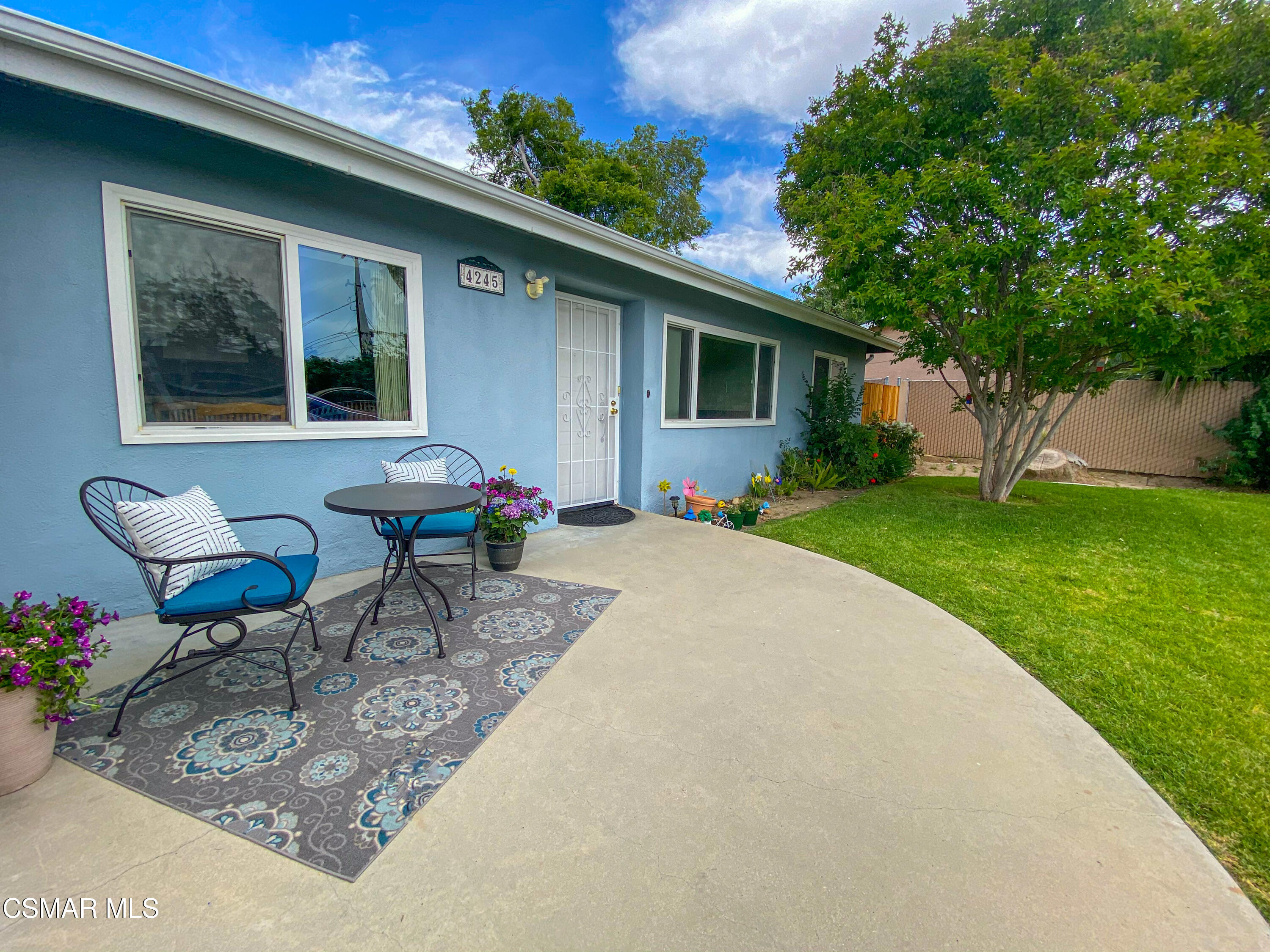 4245 Adam Road Simi Valley, CA 93063 - Photo 15 of 20 a backyard of a house with table and chairs