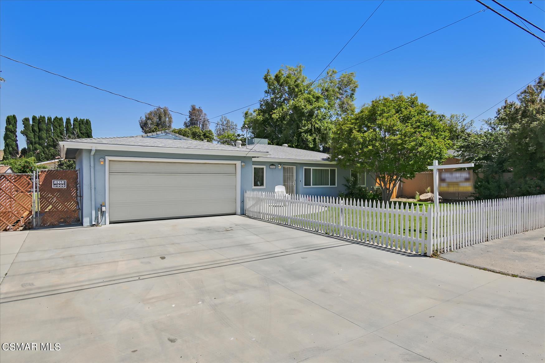 4245 Adam Road Simi Valley, CA 93063 - Photo 18 of 20 front view of a house with a garage