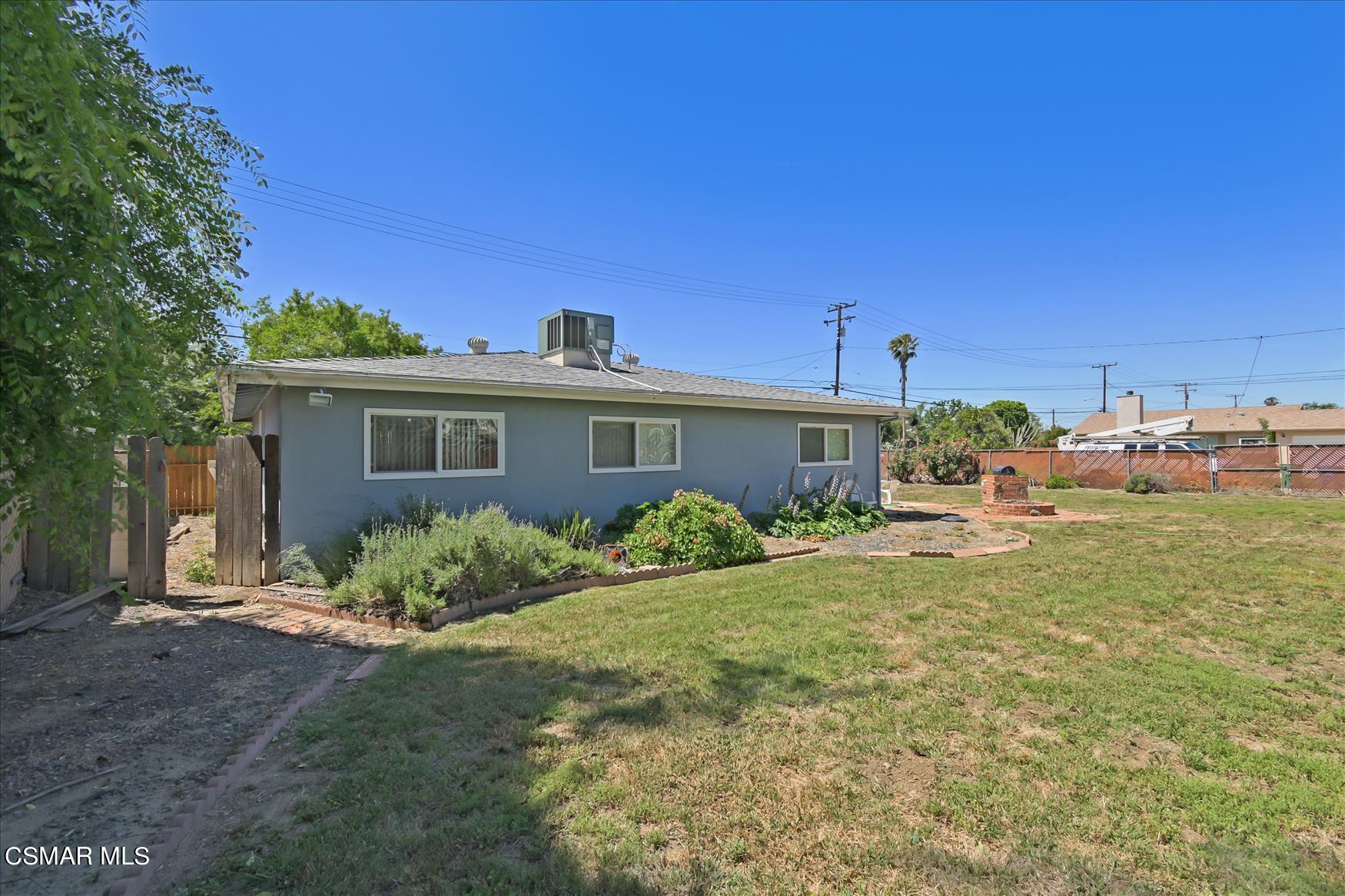 4245 Adam Road Simi Valley, CA 93063 - Photo 19 of 20 a front view of a house with garden