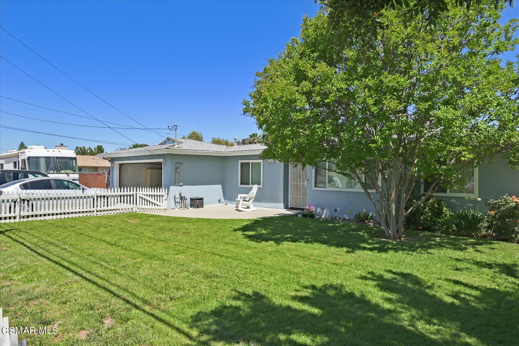 4245 Adam Road Simi Valley, CA 93063 - Photo 20 of 20 a front view of a house with backyard porch and outdoor seating