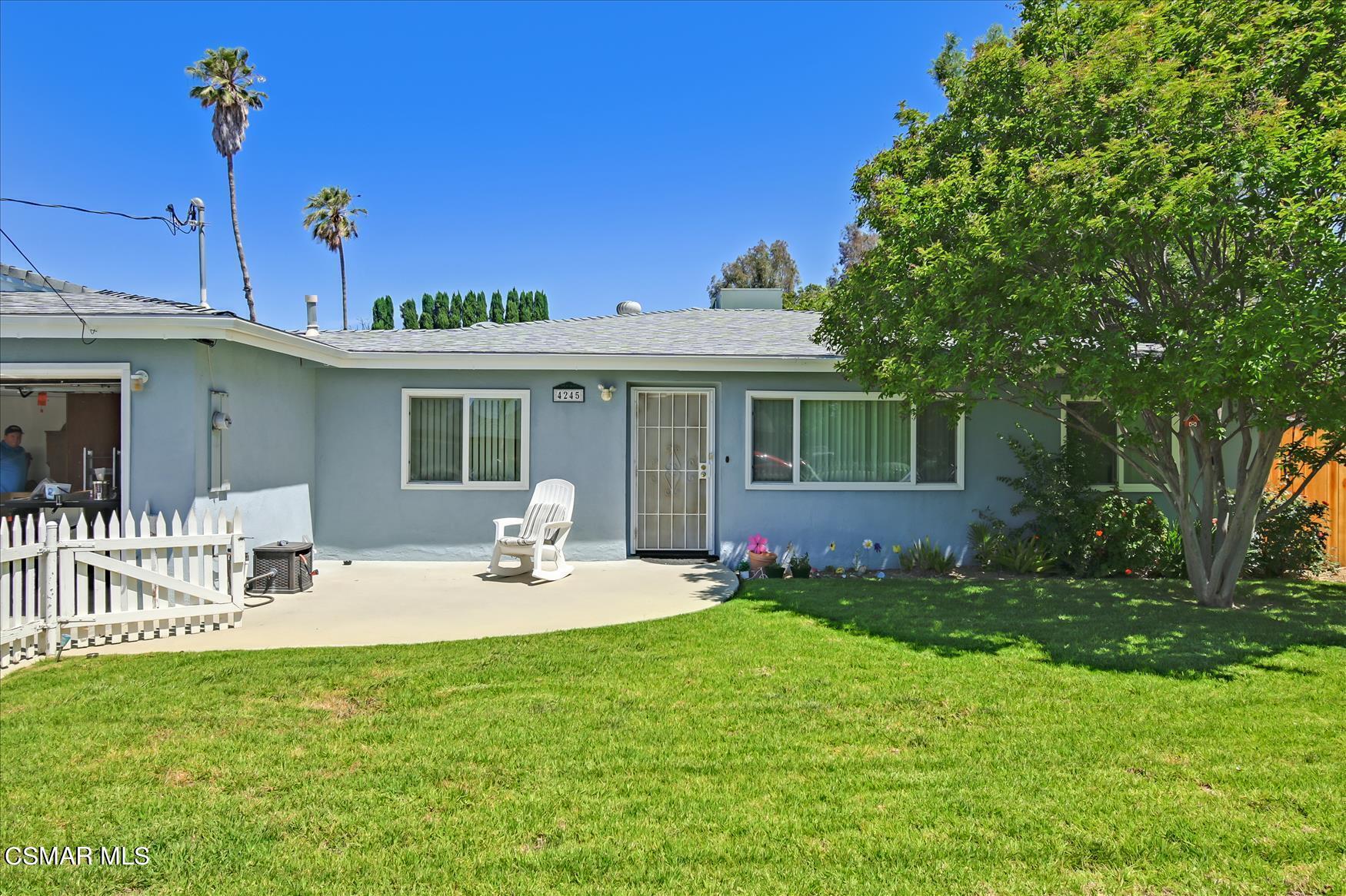 4245 Adam Road Simi Valley, CA 93063 - Photo 2 of 20 a view of a house with backyard sitting area and garden