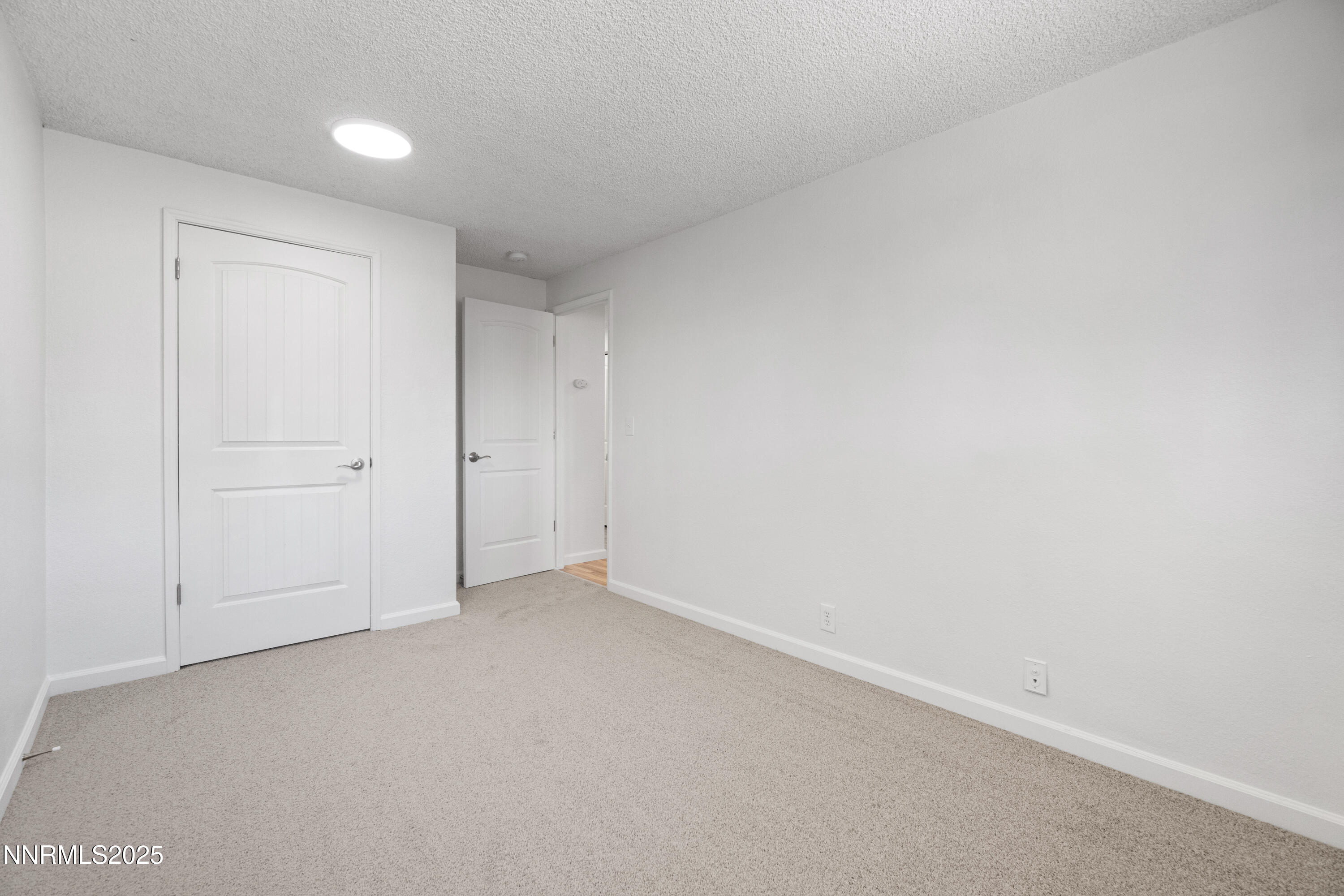 129 Ring Road Dayton, NV 89403 - Photo 18 of 27 a view of an empty room