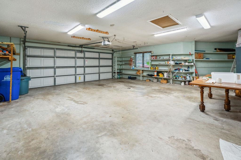 708 Prince Road St. Augustine, FL 32086 - Photo 33 of 41 a view of a garage with a large window