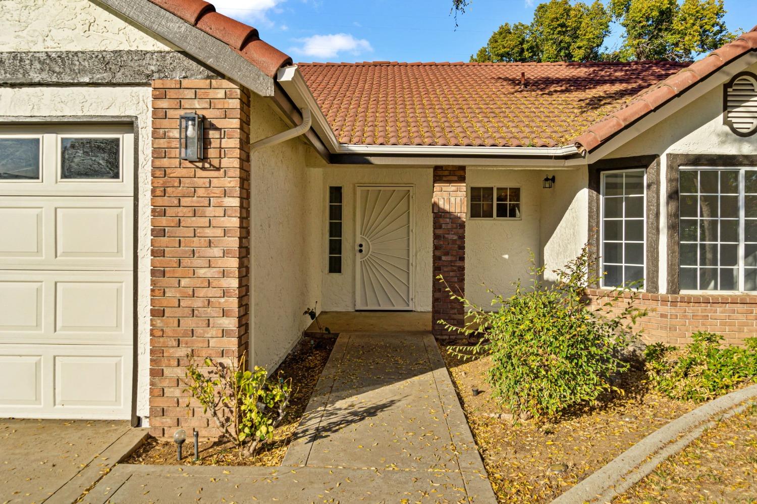 2481 Gibson Avenue Clovis, CA 93611 - Photo 4 of 24 a front view of a house