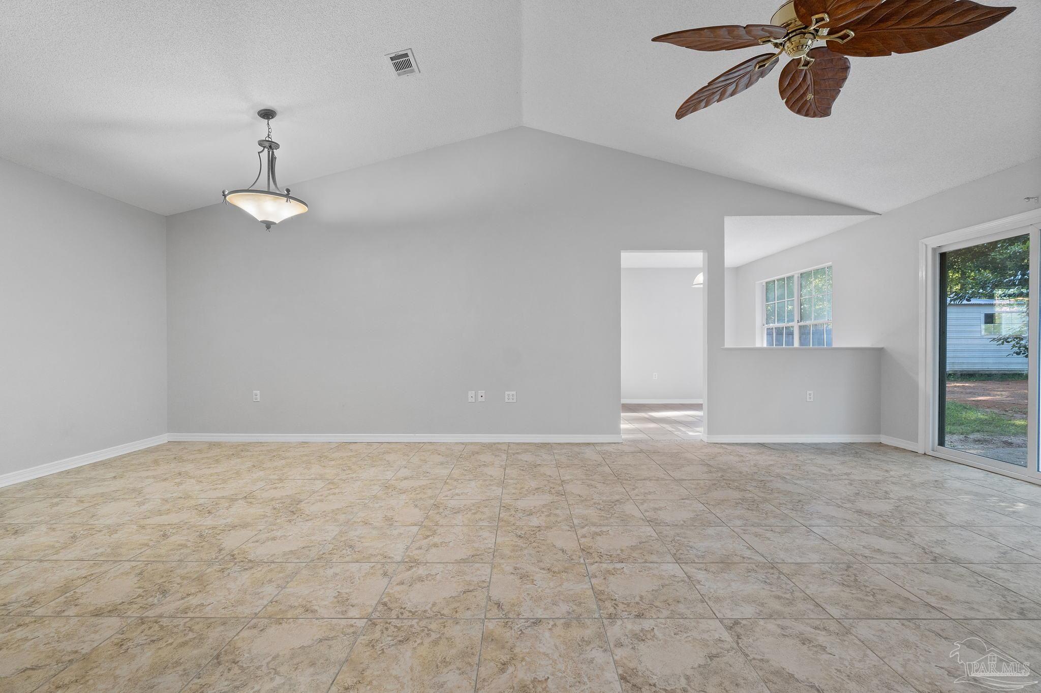 6216 Billoree Road Milton, FL 32571 - Photo 24 of 50 a view of an empty room with a window