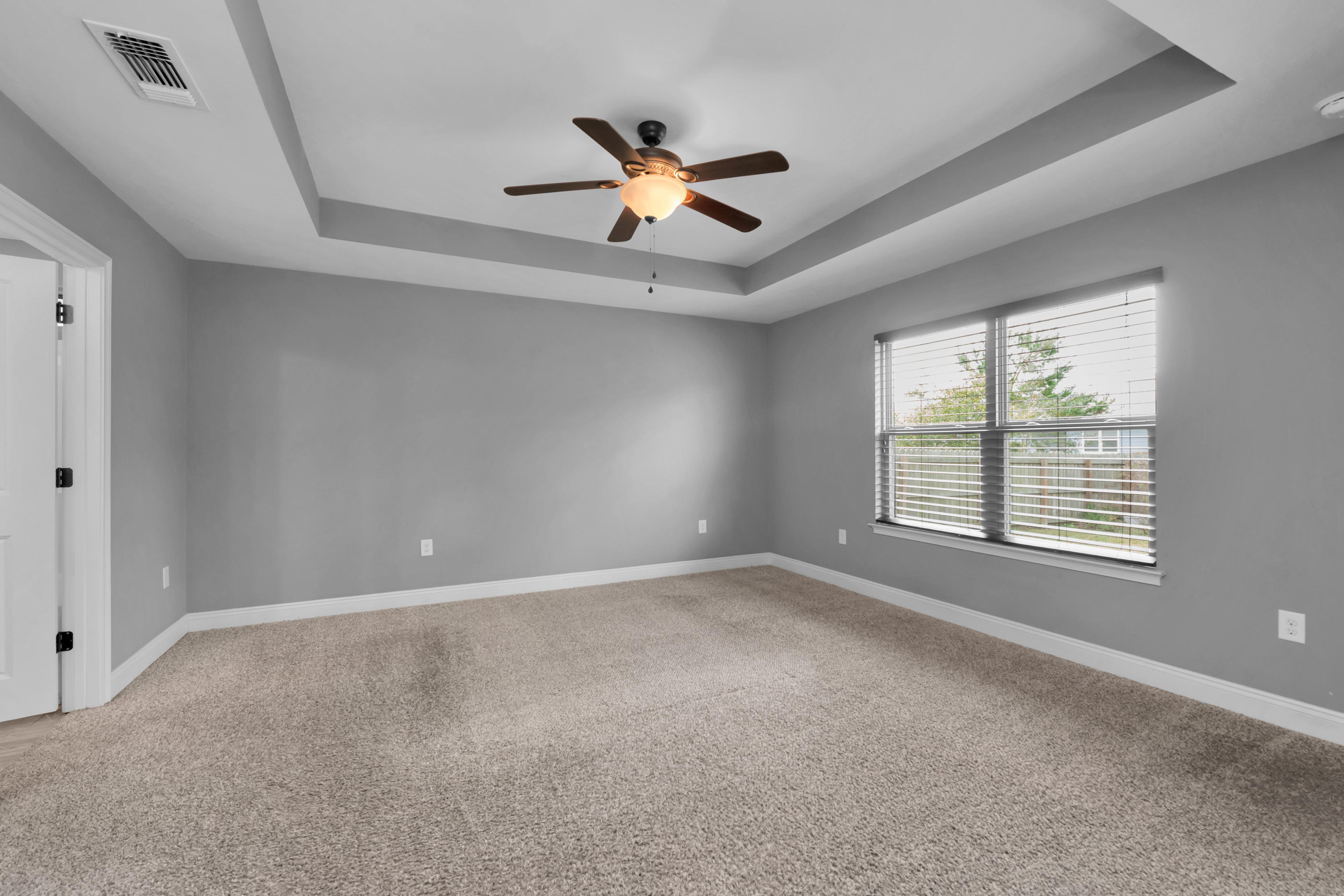 2047 Alhambra Street Navarre, FL 32566 - Photo 11 of 24 a view of an empty room with a window