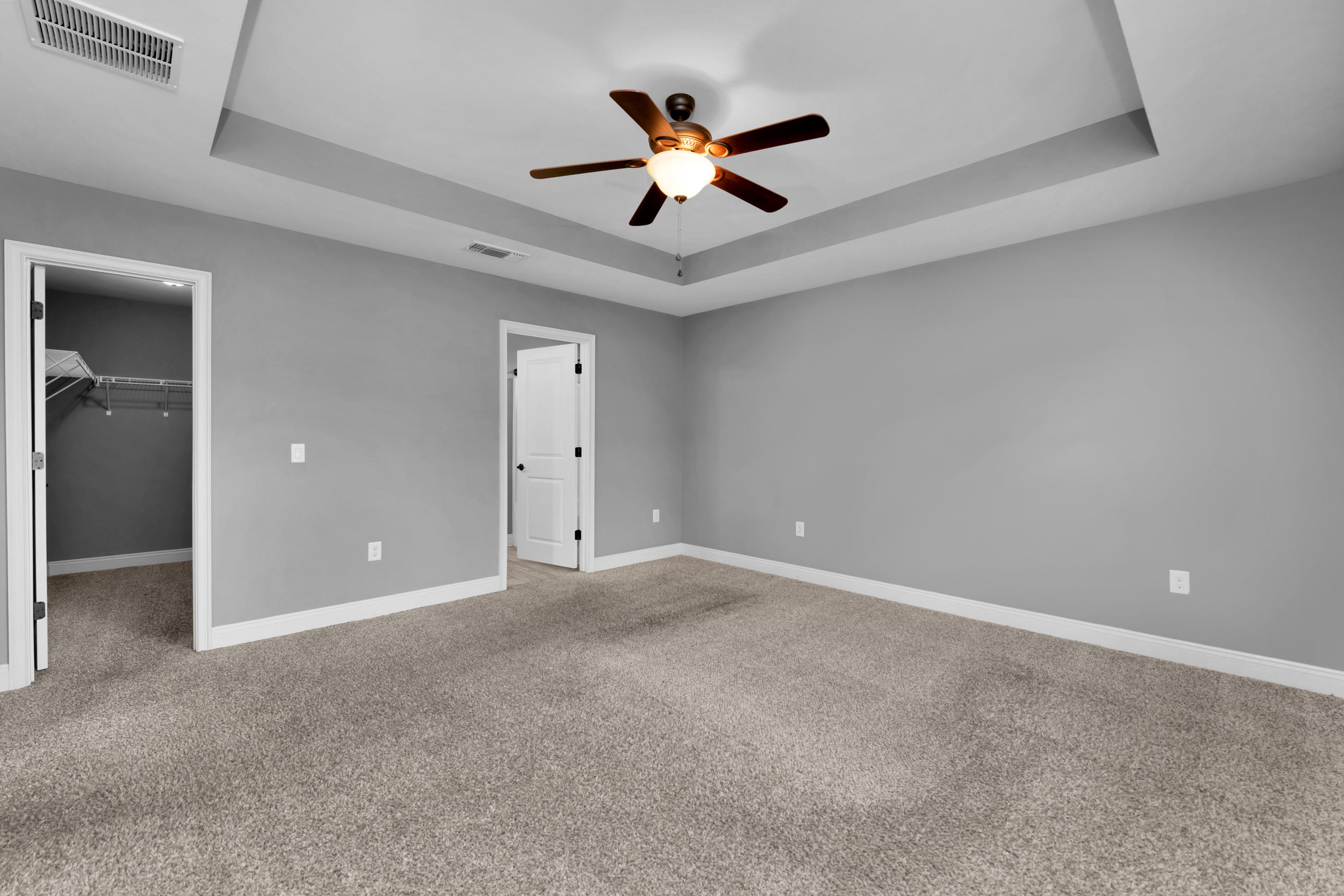 2047 Alhambra Street Navarre, FL 32566 - Photo 12 of 24 an empty room with ceiling fan and window