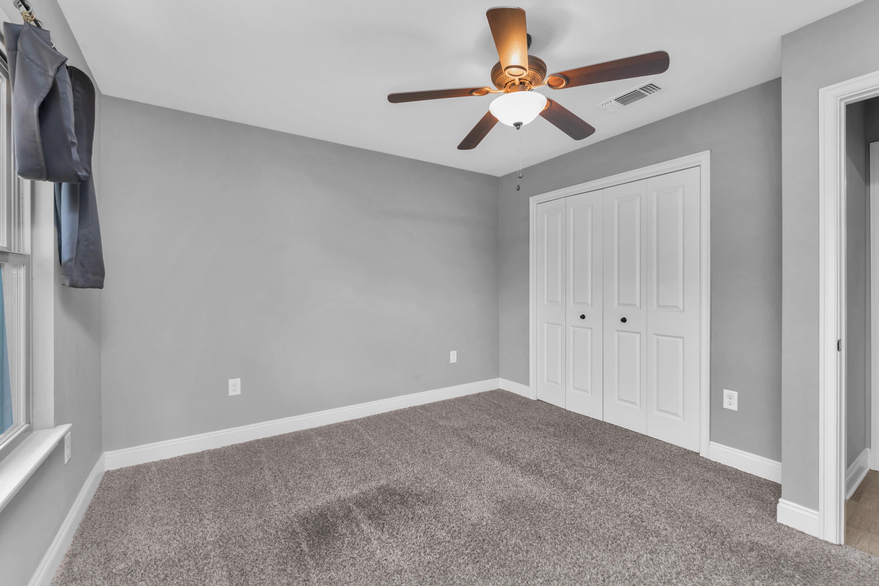 2047 Alhambra Street Navarre, FL 32566 - Photo 17 of 24 a view of an empty room