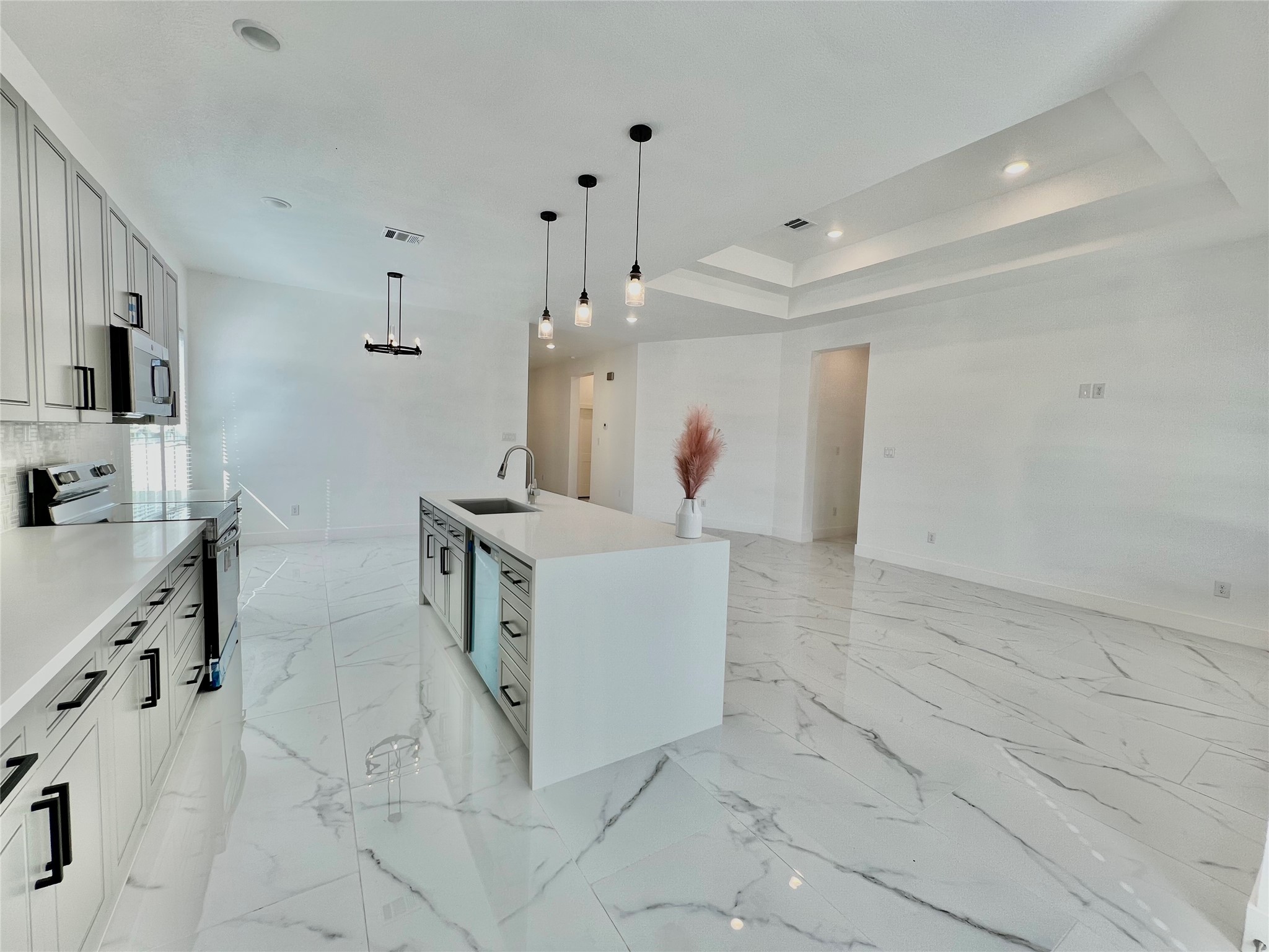 10127 Grover Lane Houston, TX 77041 - Photo 3 of 13 a view of kitchen with cabinets and window
