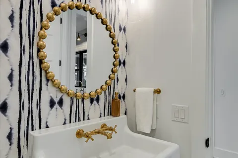 wooden floor with white walls