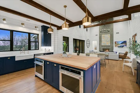 a view of a kitchen area with furniture and window
