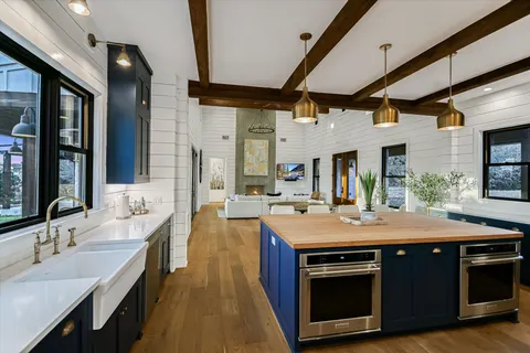 a kitchen with a stove and a sink