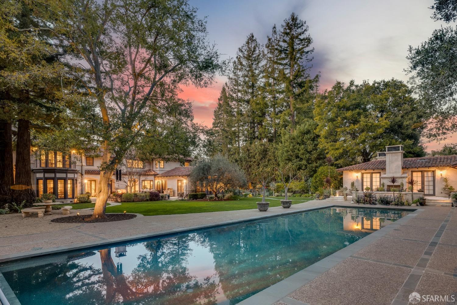 75 Almendral Avenue Atherton, CA 94027 - Photo 1 of 40 a view of a house with a yard and sitting area