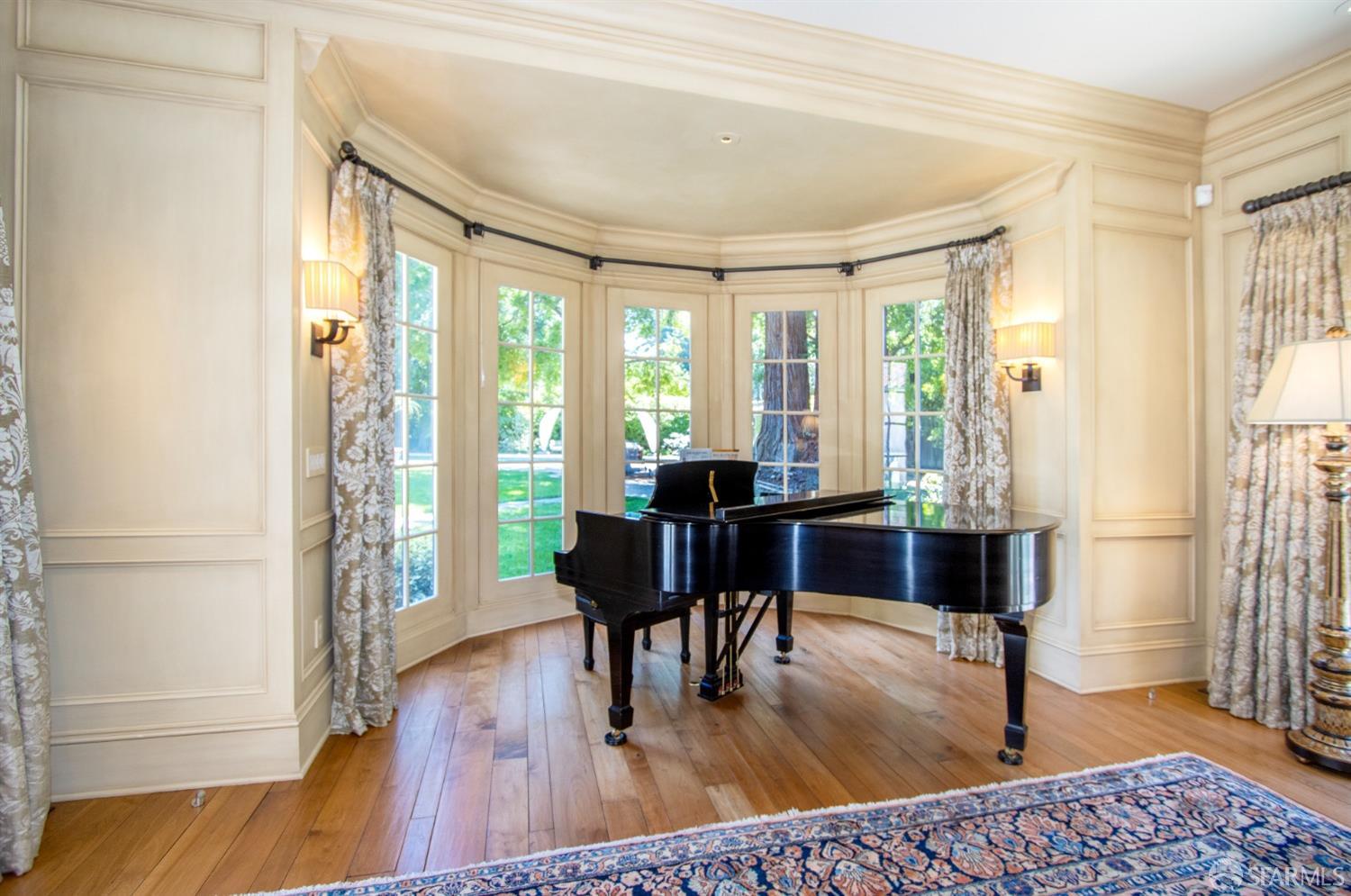 75 Almendral Avenue Atherton, CA 94027 - Photo 18 of 40 a living room with furniture and a window