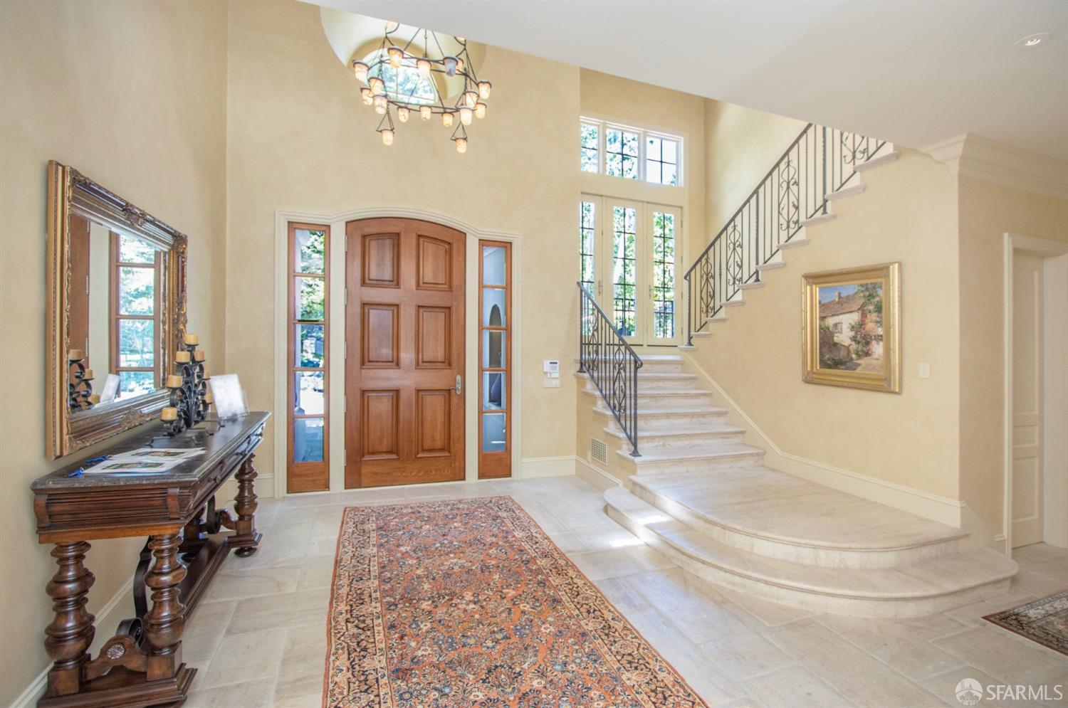 75 Almendral Avenue Atherton, CA 94027 - Photo 19 of 40 a view of a livingroom with furniture and staircase