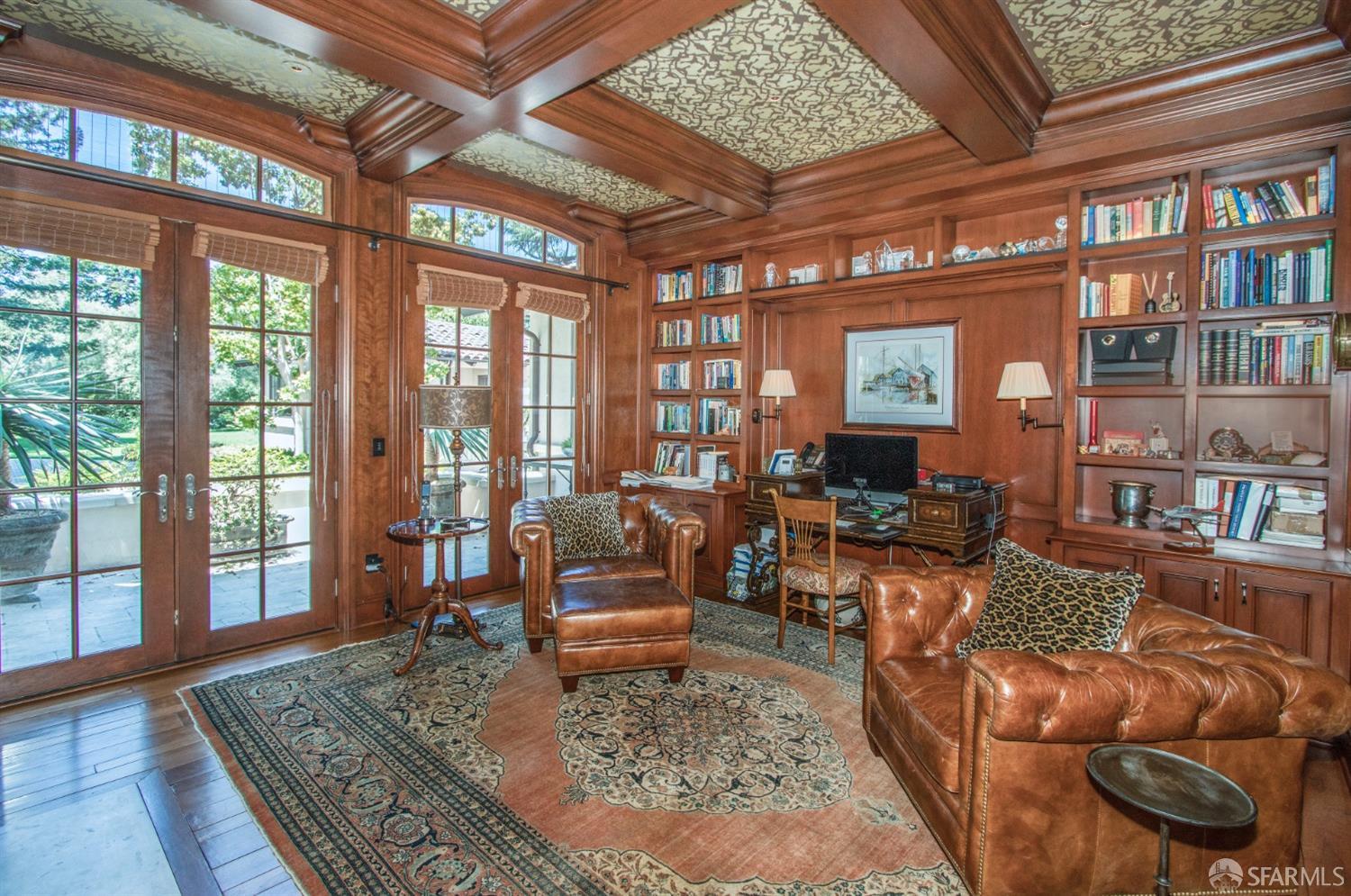 75 Almendral Avenue Atherton, CA 94027 - Photo 20 of 40 a living room with furniture or rug and a table