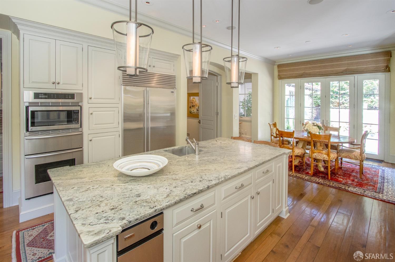 75 Almendral Avenue Atherton, CA 94027 - Photo 28 of 40 a kitchen with stainless steel appliances granite countertop a stove and refrigerator