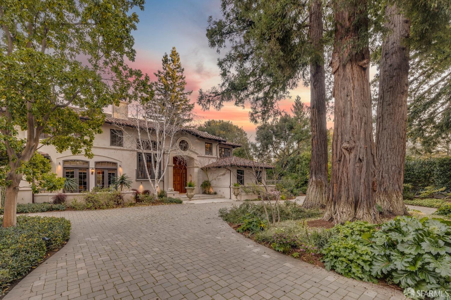 75 Almendral Avenue Atherton, CA 94027 - Photo 4 of 40 a front view of a house with a yard and tree s