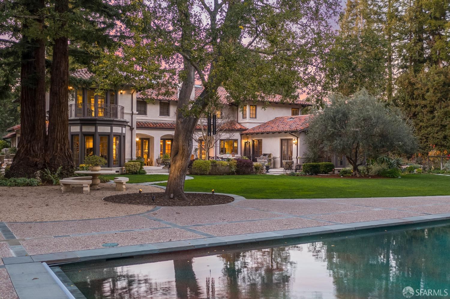 75 Almendral Avenue Atherton, CA 94027 - Photo 8 of 40 a front view of a house with a yard