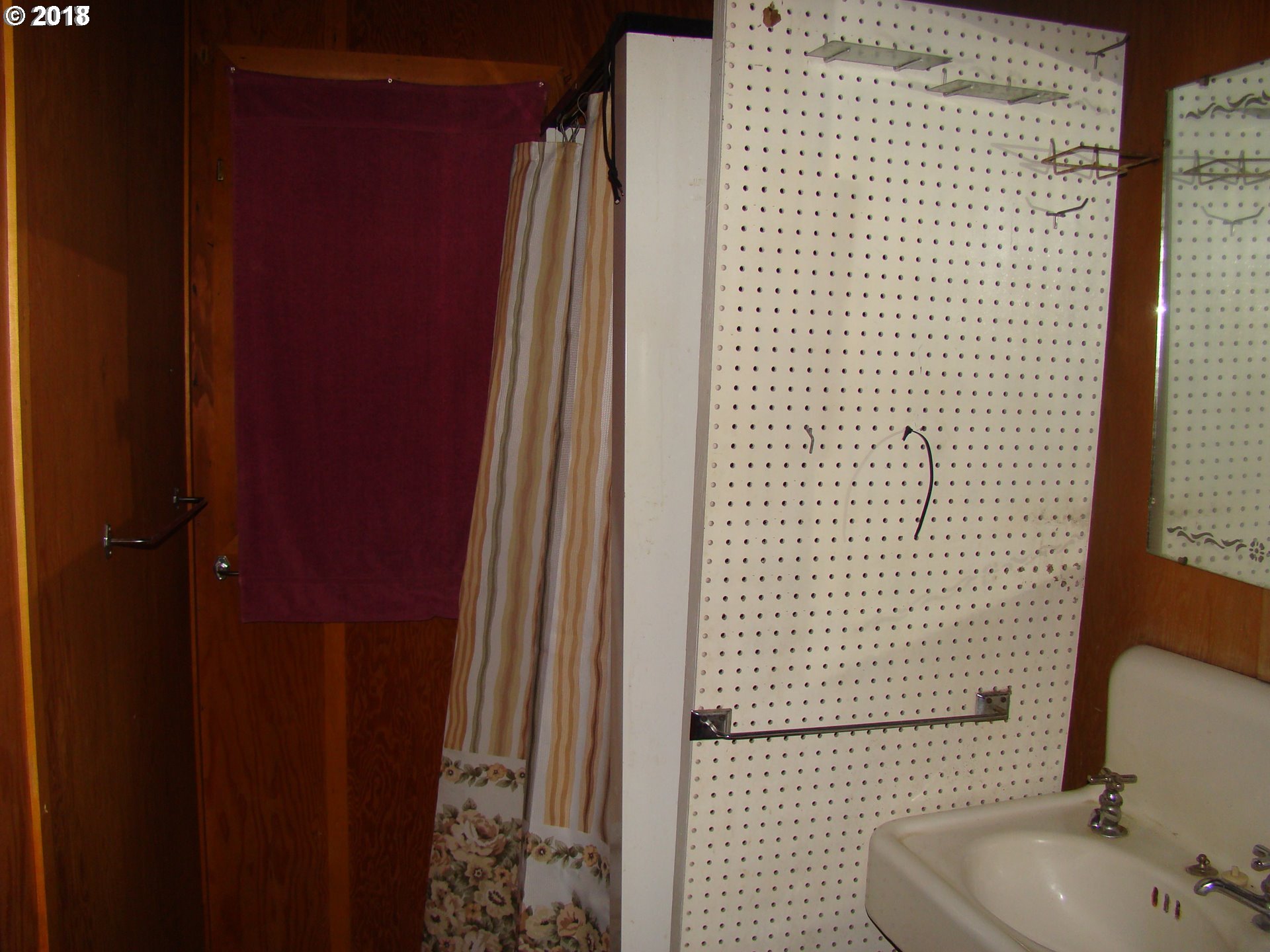 60003 Wilderness Road Joseph, OR 97846 - Photo 9 of 9 a bathroom with a shower curtain and a sink