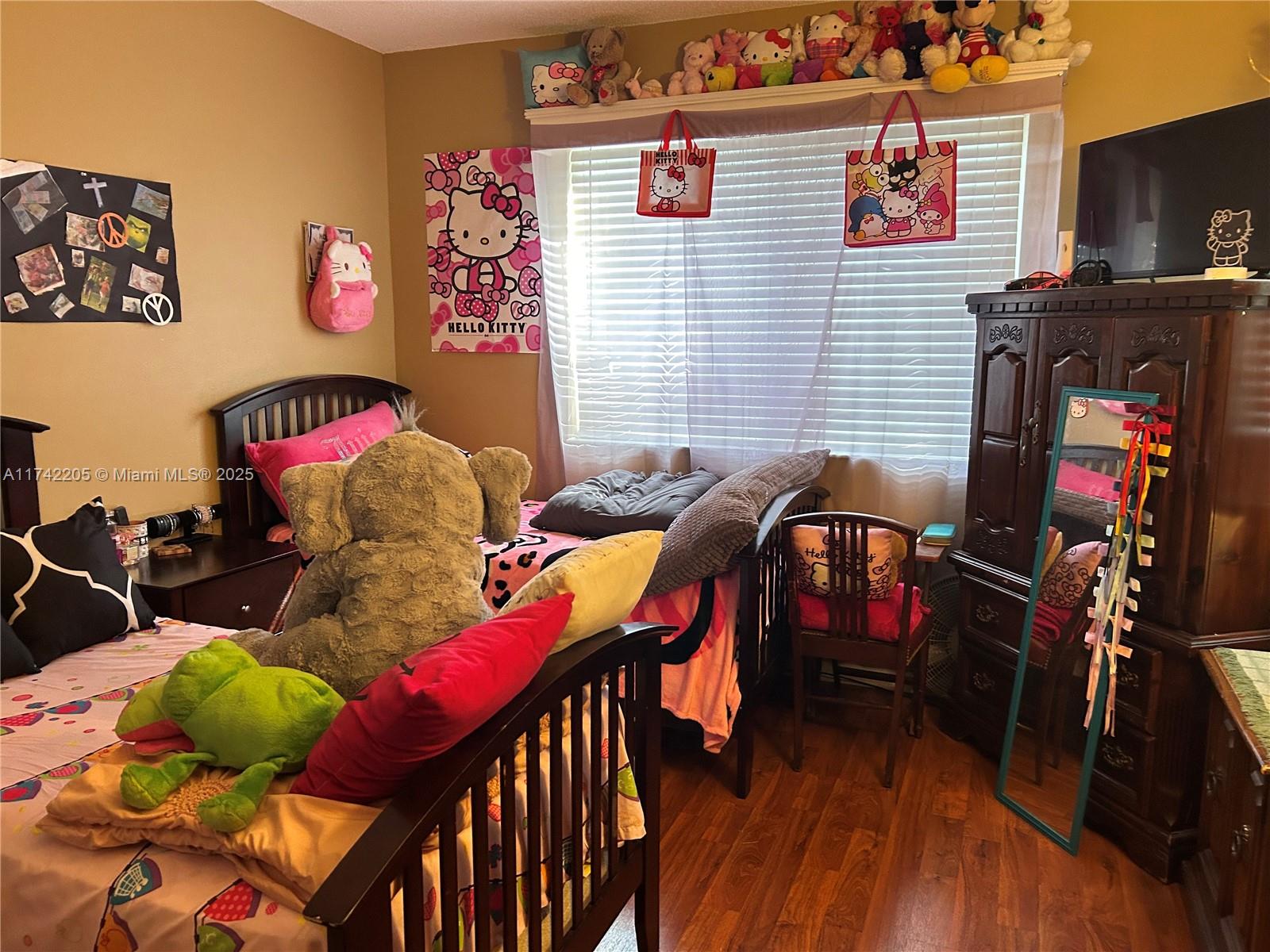7940 North Nob Hill Road, Unit 201 Tamarac, FL 33321 - Photo 6 of 10 a view of a room with furniture and wooden floor